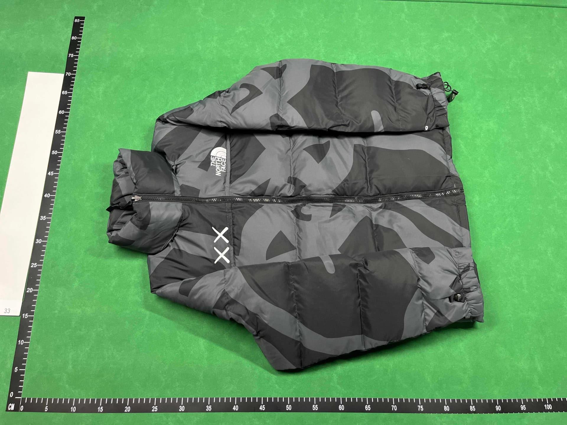 North face x Kaws puffer from Weidian