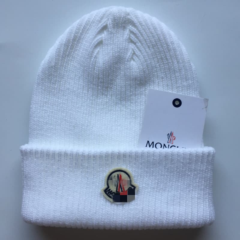 Factory wholesale knitted hat autumn and winter men's warm hat European and American woolen cap flanging closed toe beanie hat cold proof earmuffs hat from 1688