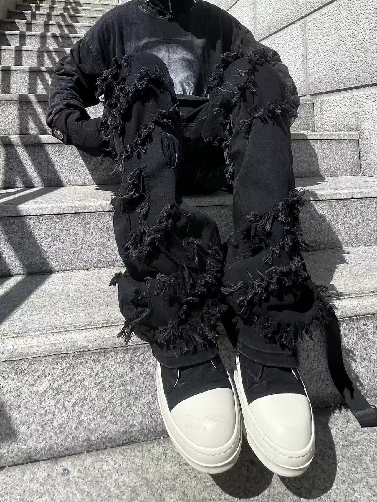 TRB Dark High Street RO Functional Wind Double layer Knife Cut Damaged Micro flared Trousers Erosion Ribbon Loose Jeans — product from Taobao, photo 1 of 1