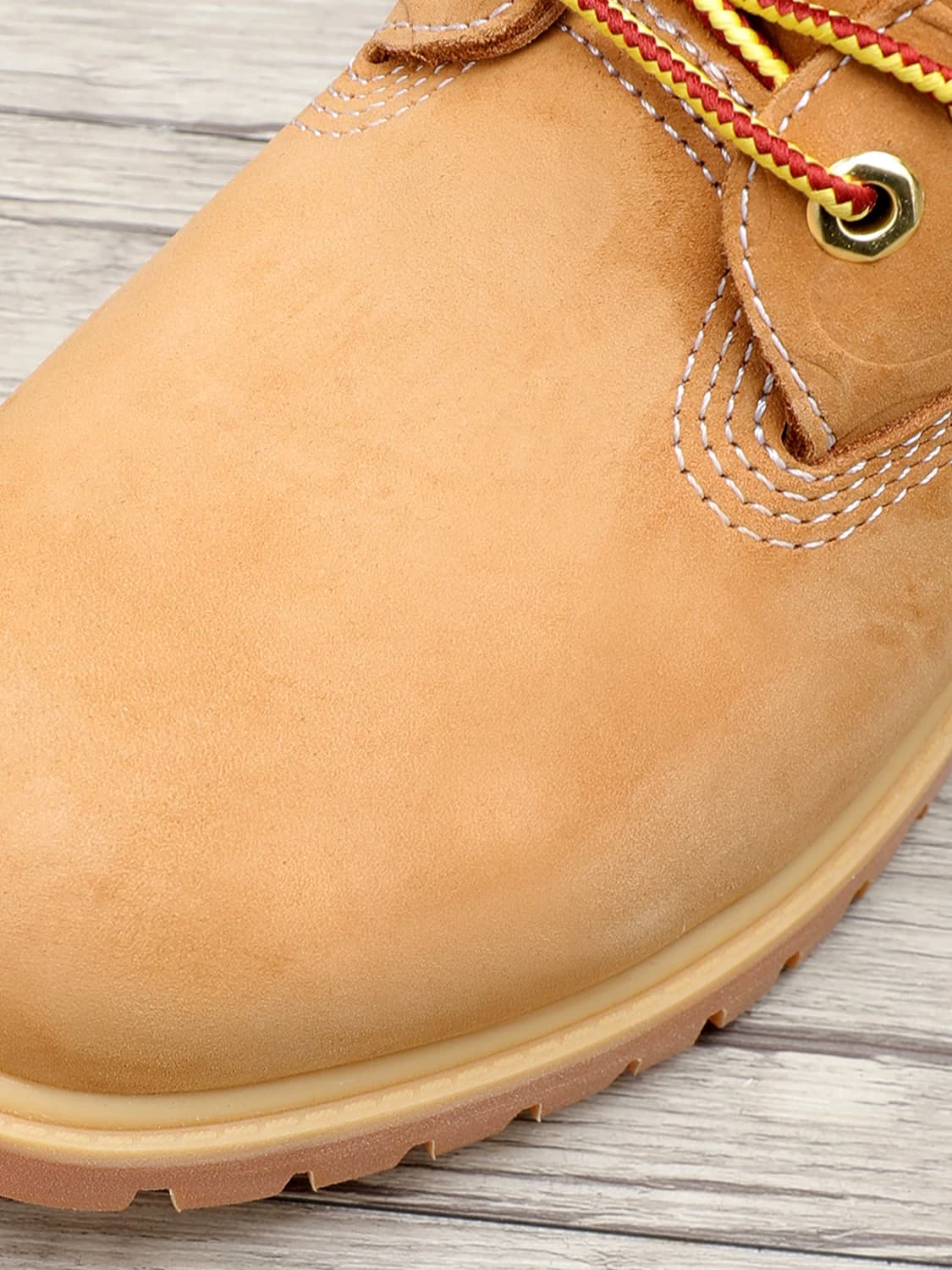 Martin boots men's big yellow boots kick proof ape head joint model first layer of cowhide waterproof couple shoes women's warm winter — product from Taobao, photo 1 of 1